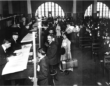 Old photograph of people coming through ellis island