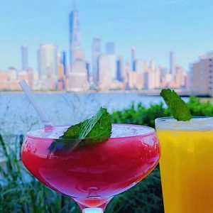 cocktails and a view of the Manhattan skyline