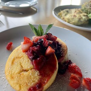 buttermilk pancakes topped with berries