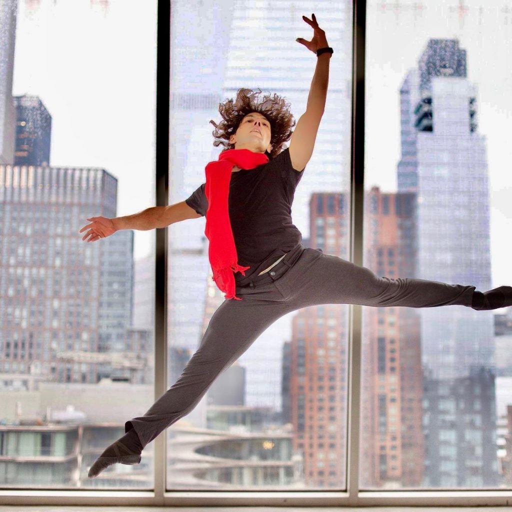 man performing a ballet leap