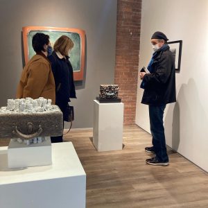 3 people touring Novado Gallery