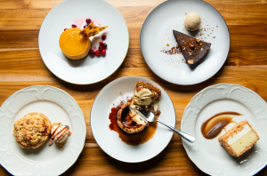 5 small plates of various dessert