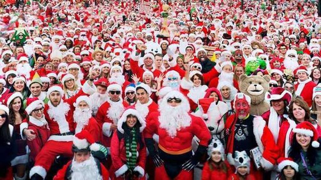 Hoboken SantaCon, large crowd all dressed as Santa Clause