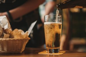 Beer being poured into glass