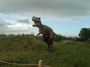 Image of T-Rex figure at Hudson County's "Field Station: Dinosaurs" attraction.