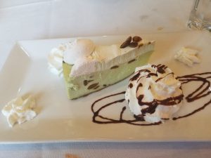 Plate of a pistachio cake like dessert