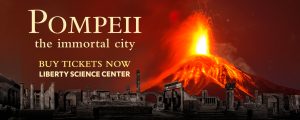 site banner with the photo of an erupting volcano with text "Pompeii: the immortal city, Get tickets now, Liberty Science Center