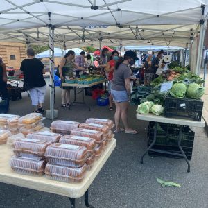 people shopping at the Bayonne Farmers Market