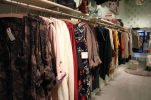 racks of clothing inside Mint Market