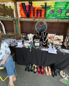 vendor table of vintage items at Pacific Flea market