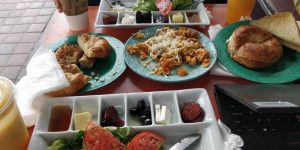 various plates of breakfast food