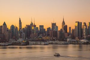 Lincoln Harbor at sunset with NY buildings in the background from the New York Waterway