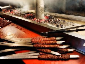 shish kebab being prepared and cooked