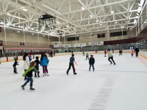 kids skating on ice rink
