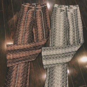 two pairs of snake skin pattern pants 