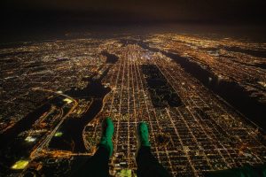 aerial view of Manhattan at night from a helicopter