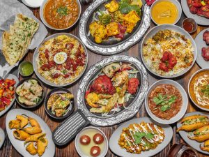 various multiple plates of Indian cuisine from Urban Tandoor restaurant